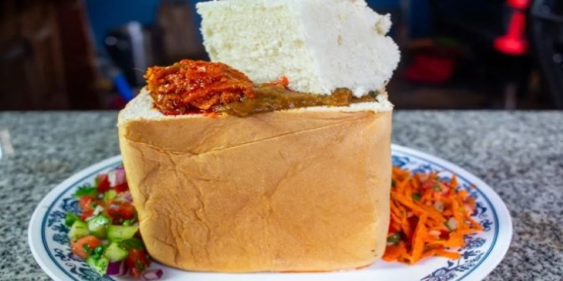 A bread with a piece of bread on it AI-generated content may be incorrect.
